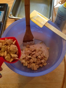 Add-in the cinnamon and Apple Cinnamon Chex cereal to the melted marshmallows and stir with buttered spatula